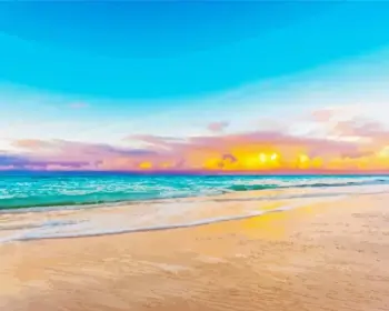 Golden beach sunset diamond painting kit — glowing sun over turquoise waves and sandy shore