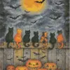 Many cats looking at the full moon on a Halloween night