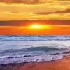 Ocean waves at sunset diamond painting kit — glowing orange sunset over rolling sea waves