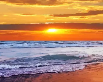 Ocean waves at sunset diamond painting kit — glowing orange sunset over rolling sea waves