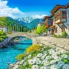 Peaceful mountain village diamond painting kit with scenic mountain landscape