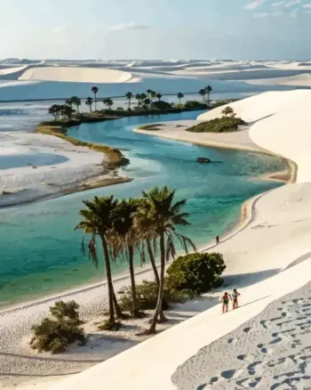 Turquoise desert oasis surrounded by white sand dunes and palm trees